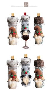 Three-piece set of knitted Christmas wine bottle covers with gnome figures and fur trim