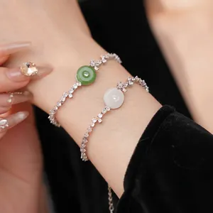 Elegant zircon and chalcedony bracelets in green and white with wavy pave-set bands