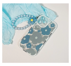 Blue plumeria patterns on clear iPhone case with matching beaded wrist strap and flower charm