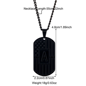 Detailed view of black stainless steel dog tag pendant with American flag and letter A
