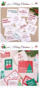 Close-up of decorative Christmas gift tags with snowman and reindeer festive patterns