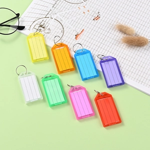 Étiquettes de clés colorées en plastique avec étiquettes inscriptibles et anneaux en métal