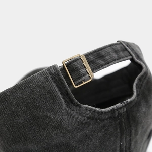 Adjustable back strap of vintage washed cotton baseball cap with antique bronze metal buckle