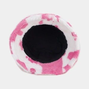 Pink cow print plush bucket hat with warm faux fur material and soft black lining