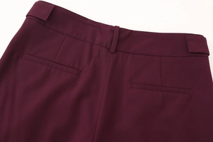 Detail of burgundy bomber set showing back waistband with loops and refined stitching