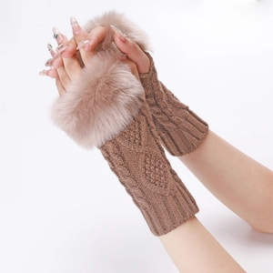 Detail of coffee brown cable knit fingerless gloves with plush faux fur cuffs for winter
