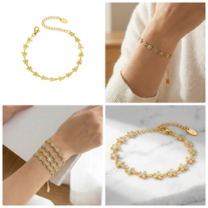 Detailed views of 18K gold plated flower bracelet with light blue enamel accents
