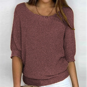 Dusty pink knit short-sleeve top featuring hollow-out texture and crew neck