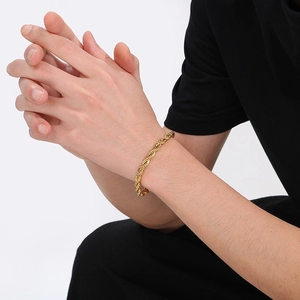 Men's golden stainless steel twisted rope chain bracelet with a high-polished finish