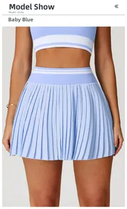 Detail of baby blue pleated tennis skirt with white striped waistband for sports