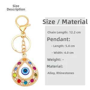 Detail view of Evil Eye keychain pendant with colorful rhinestones and size measurements
