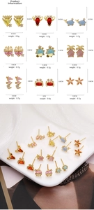Detailed close-up of marine series gold-plated studs with colorful cubic zirconia