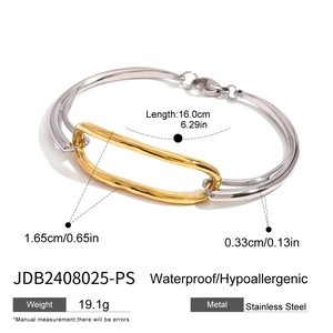 Two-tone 18k stainless steel geometric bangle with hammered texture and gold accents