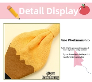 Close-up detail of tight sewing craftsmanship on the handmade fabric pencil bow hair clip