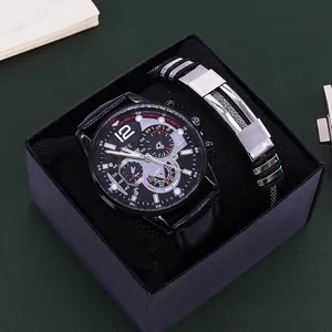 Close-up of men's gift set featuring a black leather watch and metal chain bracelet