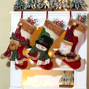 Three-piece Christmas stockings set with 3D reindeer, snowman and Santa Claus plush dolls
