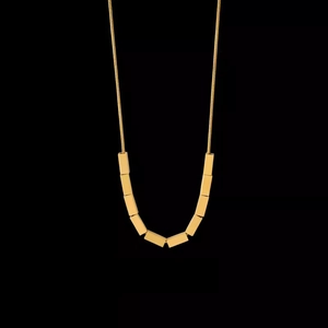 Minimalist gold square necklace for women featuring geometric pendants on a snake chain