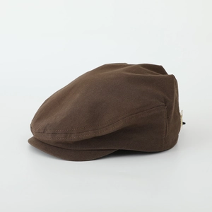 Detail view of coffee brown suede kids beret hat showing high-quality stitching and fabric