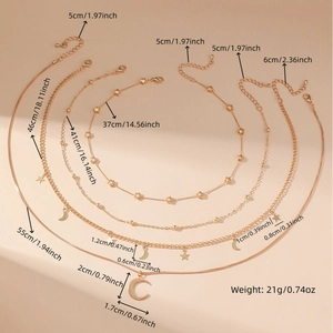 Detailed size chart for layered gold necklace with starfish, moon and star pendants