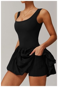 Close-up of black athletic dress featuring side pockets and high-elastic quick-dry fabric