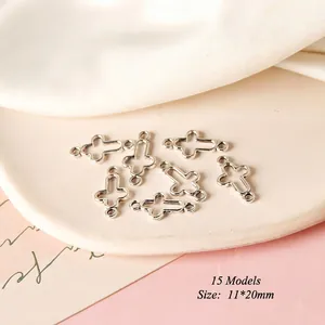 Detail of 11x20mm polished silver alloy hollow cross pendants for DIY earring jewelry making