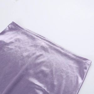 Close-up detail of purple velvet satin texture on a slim fit sexy V-neck dress