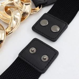 Women's black elastic waist belt with gold chunky chain and snap button closure