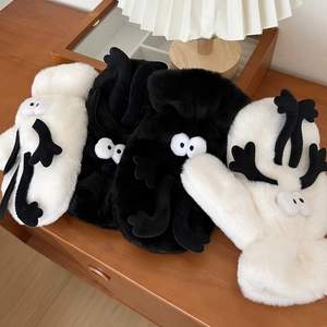 Cute fuzzy coal sprite plush mittens in black and white with 3D eyes for winter warmth