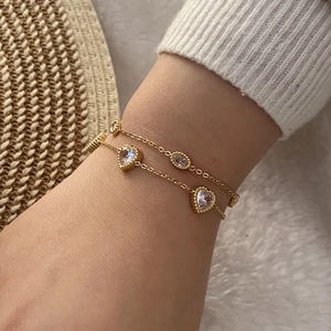Bracelet élégant à double chaîne dorée avec breloques en cristal cœur et ovales pour femme