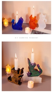 Detail of DIY cat-shaped resin candle holder molds with sparkling finished products