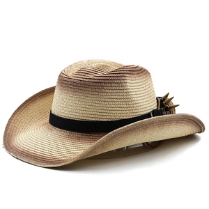 Detail of gradient western cowboy straw hat with vintage bronze spikes on black band