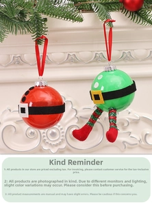 Detail of Santa and elf themed Christmas ball ornaments hanging on a festive mantle