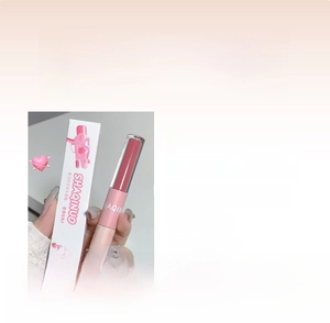Close-up of dual-ended lip glaze with double tubes for glossy and matte finishes