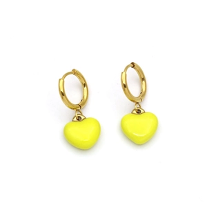 Macro shot of gold hoop earrings with vibrant yellow 3D heart-shaped charms