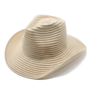 Beige wide brim crochet cowboy hat with spiral woven texture and rolled edges