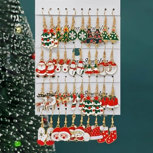 Festive Christmas earring set featuring Santa, reindeer, and snowmen in alloy enamel