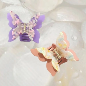 Colorful acetate butterfly hair claw clips with marble texture for elegant styling
