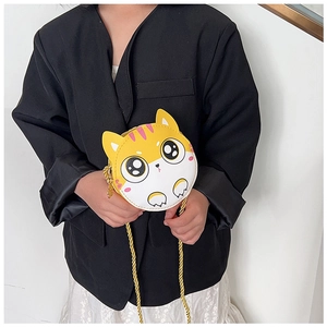 Détail du sac à bandoulière chat jaune et blanc avec chaîne dorée pour les enfants