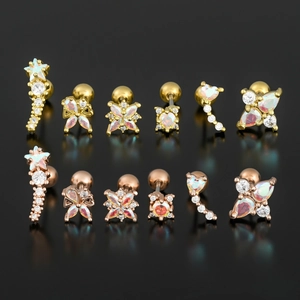 Gold and rose gold geometric cartilage earrings with iridescent opal and zircon stones