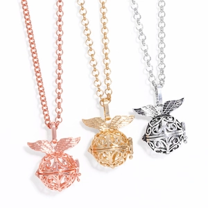 Retro Angel Wing Hollow Ball Locket Pendant Necklace Copper Aromatherapy Essential Oil Diffuser Long Chain Women