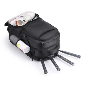 Detailed view of sports backpack with separate shoe compartment and racket storage