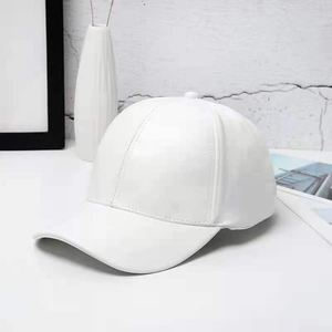 Detail of the high-quality white PU leather texture on this minimalist baseball cap
