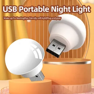 Portable USB night light with warm LED glow and white spherical eye-protection design