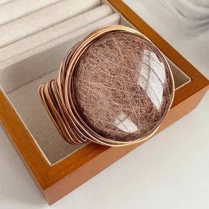 Retro round resin open arm bangle with brown fiber texture and gold wire wrap