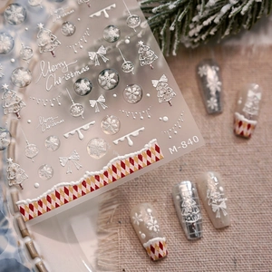 5D embossed Christmas nail stickers featuring snowflakes and trees on minimalist nails