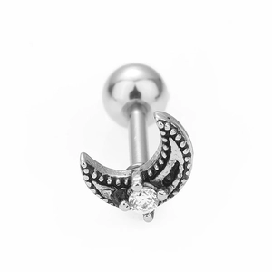 Macro shot of 316L stainless steel crescent moon cartilage earring with cubic zirconia