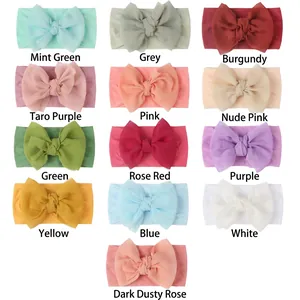 Collection of 13 colorful baby nylon headbands with large double-layered chiffon bows