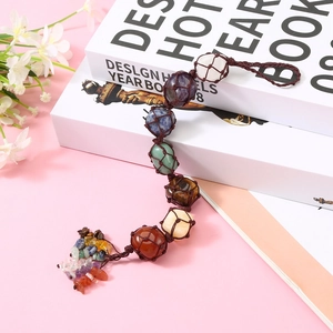 Handmade Seven Chakra raw stone hanging ornament with colorful crystal tassels and braided rope