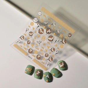 Chinese style embossed crane nail art stickers with gold clouds and calligraphy on green nails