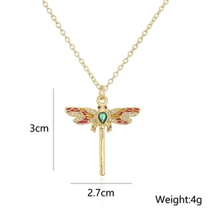 Detailed view of 18K gold dragonfly pendant with size markers showing 3cm by 2.7cm and 4g